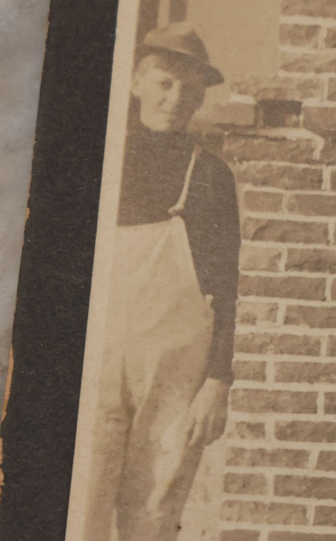Lot 091 - Antique Boarded Photograph Of Two Young Bricklayers Posing With Tools In Front Of Newly Finished Fireplace With "W" Monogram