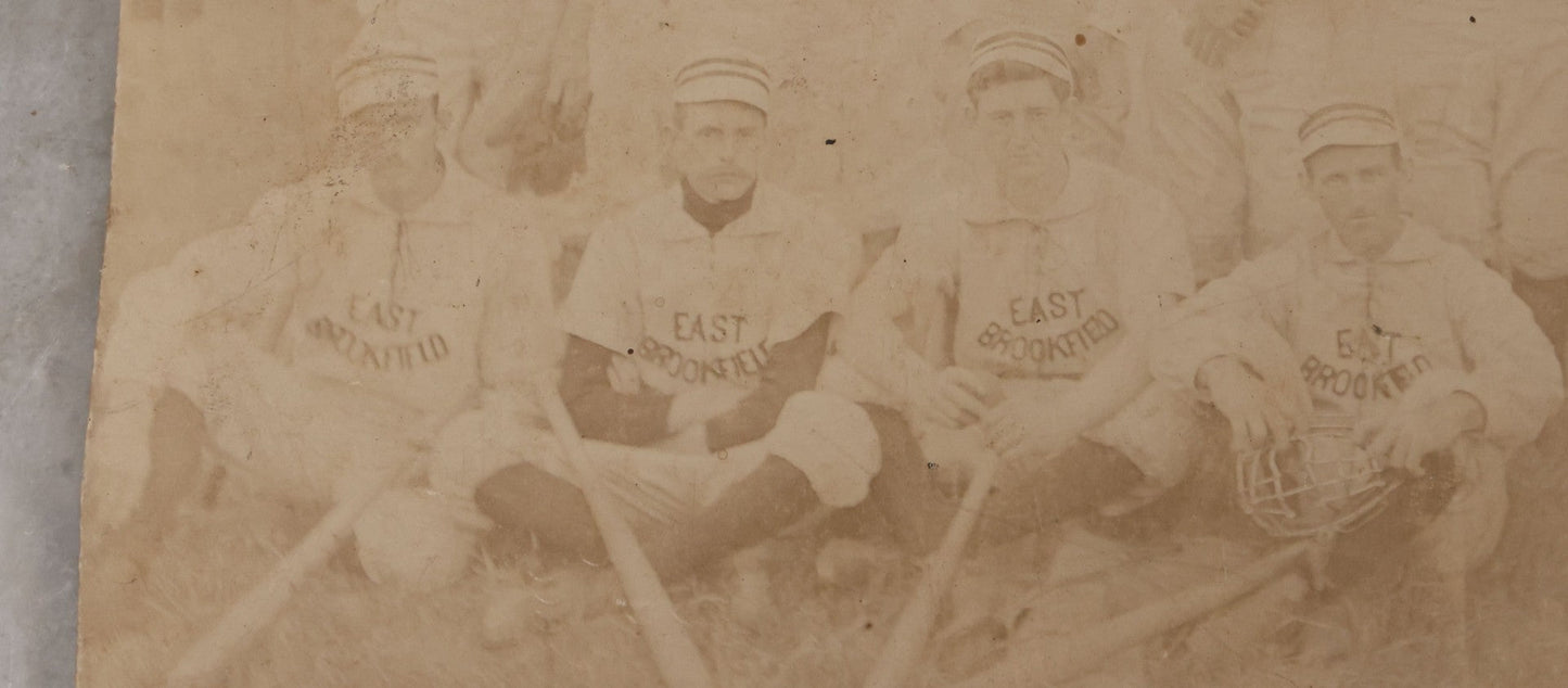 Lot 093 - Trimmed Antique Boarded Photograph Of Early Baseball Team From East Brookfield, Massachusetts, Posing With Bats And Equipment, B.L. Nichols, Photographer