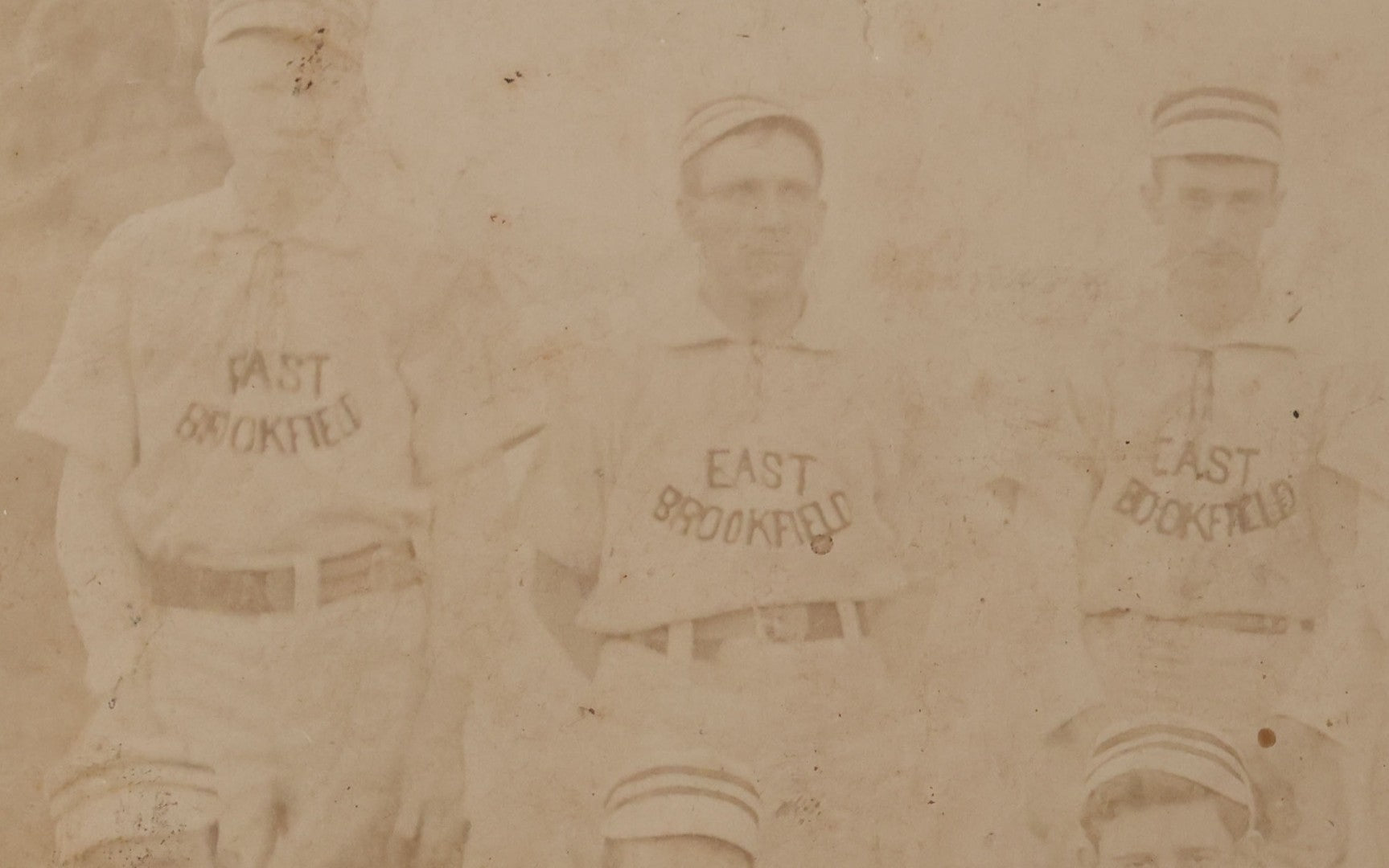 Lot 093 - Trimmed Antique Boarded Photograph Of Early Baseball Team From East Brookfield, Massachusetts, Posing With Bats And Equipment, B.L. Nichols, Photographer