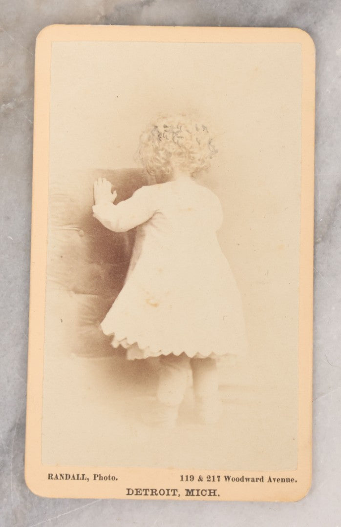 Lot 095 - Antique Carte De Visite C.D.V. Photograph Of Little Girl With Curly Blond Hair Photographed From Behind, Randall, Photographer, Detroit, Michigan
