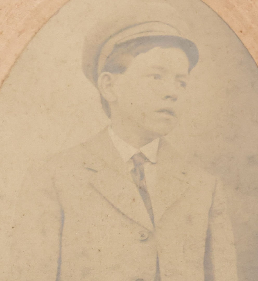 Lot 097 - Antique Trimmed Boarded Photograph Of Young Boy Photographer Posing With Turn Of The Century Box Camera