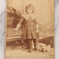 Lot 098 - Antique Cabinet Card Photograph Of Happy Little Girl Posing With Her Fluffy Dog Pull Toy, Holland Roberts, Photographers, Boston