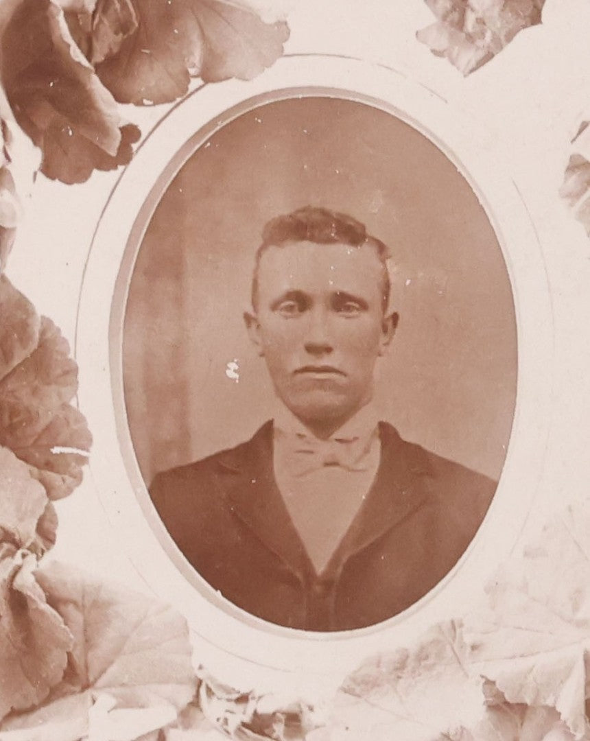 Lot 099 - Antique Cabinet Card Photograph Copy Of Tintype Of Man With Floral Wreath Surround, Likely A Remembrance Photograph