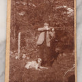 Lot 101 - Antique Cabinet Card Photograph Of Young Man Aiming A Shotgun Or Rifle With His Dog By His Feet, A.W. & G.E. Howes, Photographers, Ashfield, Massachusetts