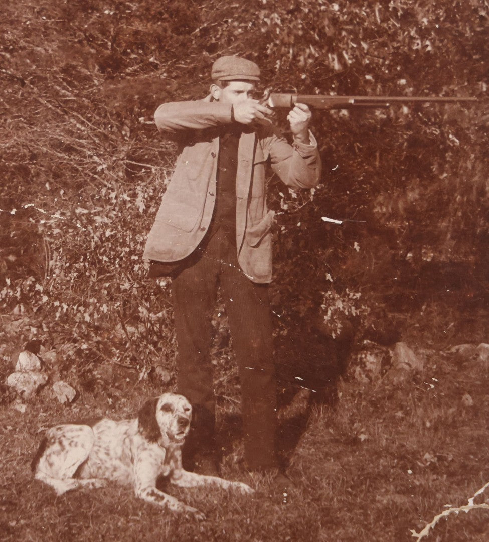 Lot 101 - Antique Cabinet Card Photograph Of Young Man Aiming A Shotgun Or Rifle With His Dog By His Feet, A.W. & G.E. Howes, Photographers, Ashfield, Massachusetts