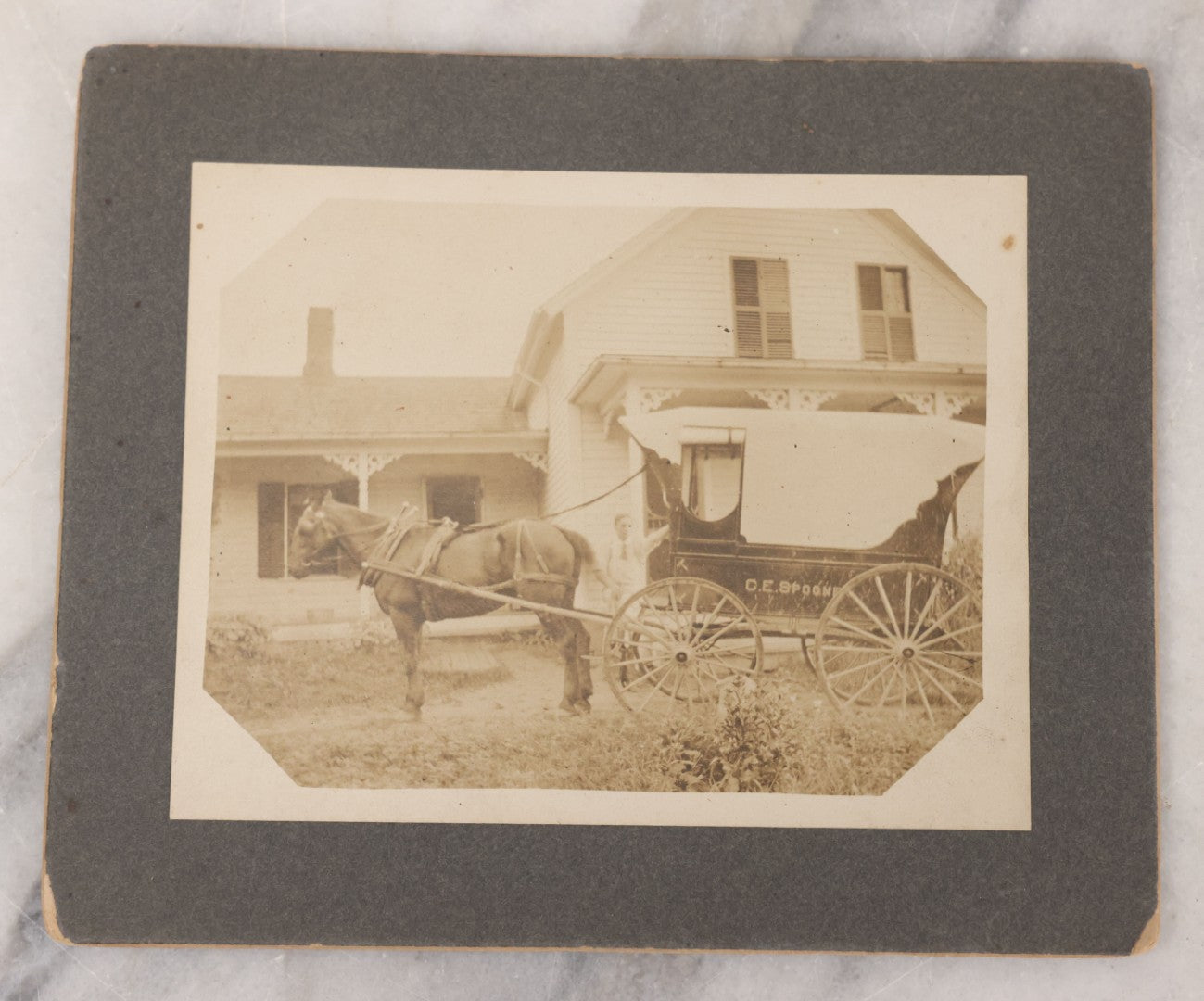 Lot 103 - Antique Boarded Occupational Photograph Of Delivery Man Posing With Horse Drawn Wagon, With Wagon Marked "C.E. Spoone," Brookfield, Massachusetts