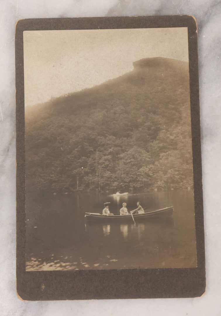 Lot 105 - Antique Cabinet Card Photograph Of Three Women Identified As Molly Sylvester And Sister With Ida, Rowing In Profile Lake With The Old Man Of The Mountain In Background, White Mountains, New Hampshire