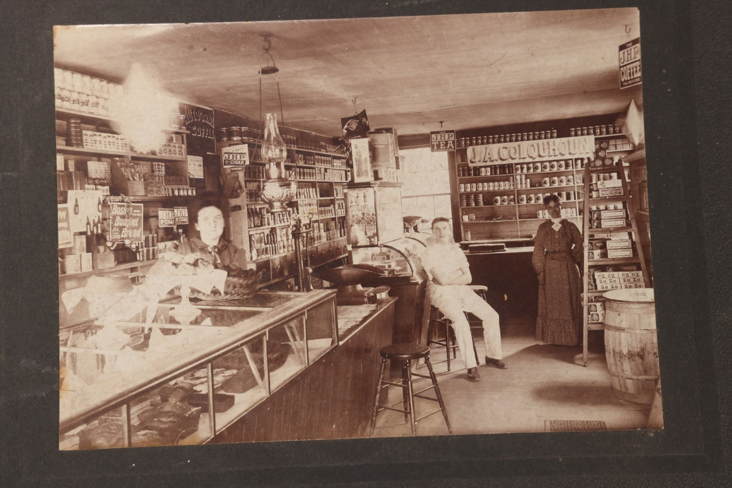 Lot 107 - Antique Boarded Occupational Photograph Of Interior Of J.A. Colquhoun General Store With Employees And Many Products In Photograph, Sturbridge, Massachusetts
