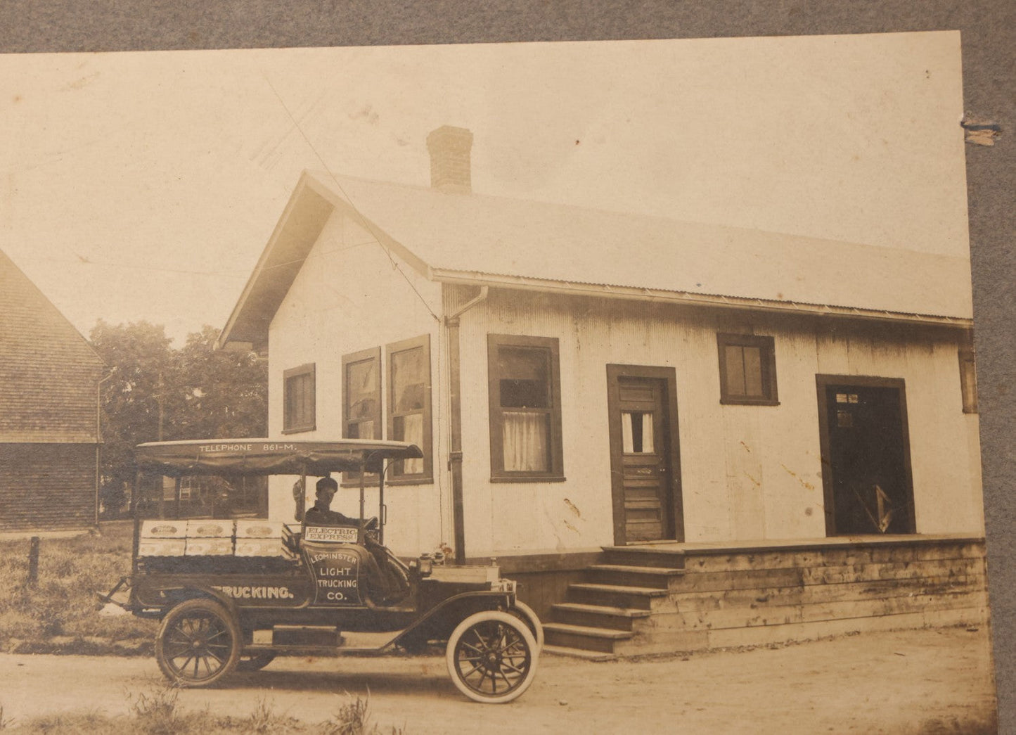 Lot 108 - Antique Boarded Occupational Photograph Of Man Driving An Early Automobile Delivery Truck For Leominster Light Trucking Co., Electric Express
