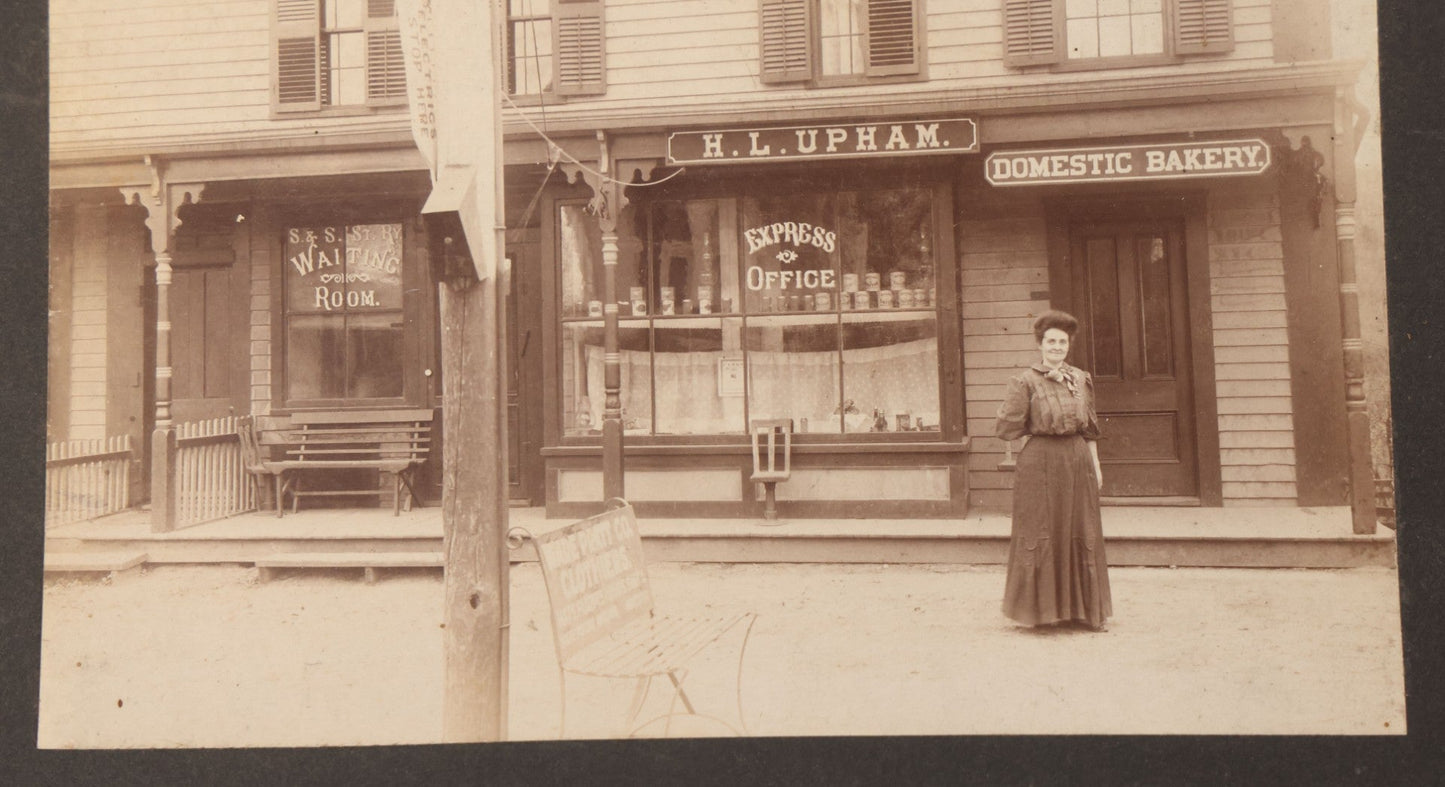 Lot 109 - Antique Boarded Occupational Photograph Of Proprietress Of H.L. Upham Domestic Bakery And Express Office Posing Outside Shop, Sturbridge, Massachusetts