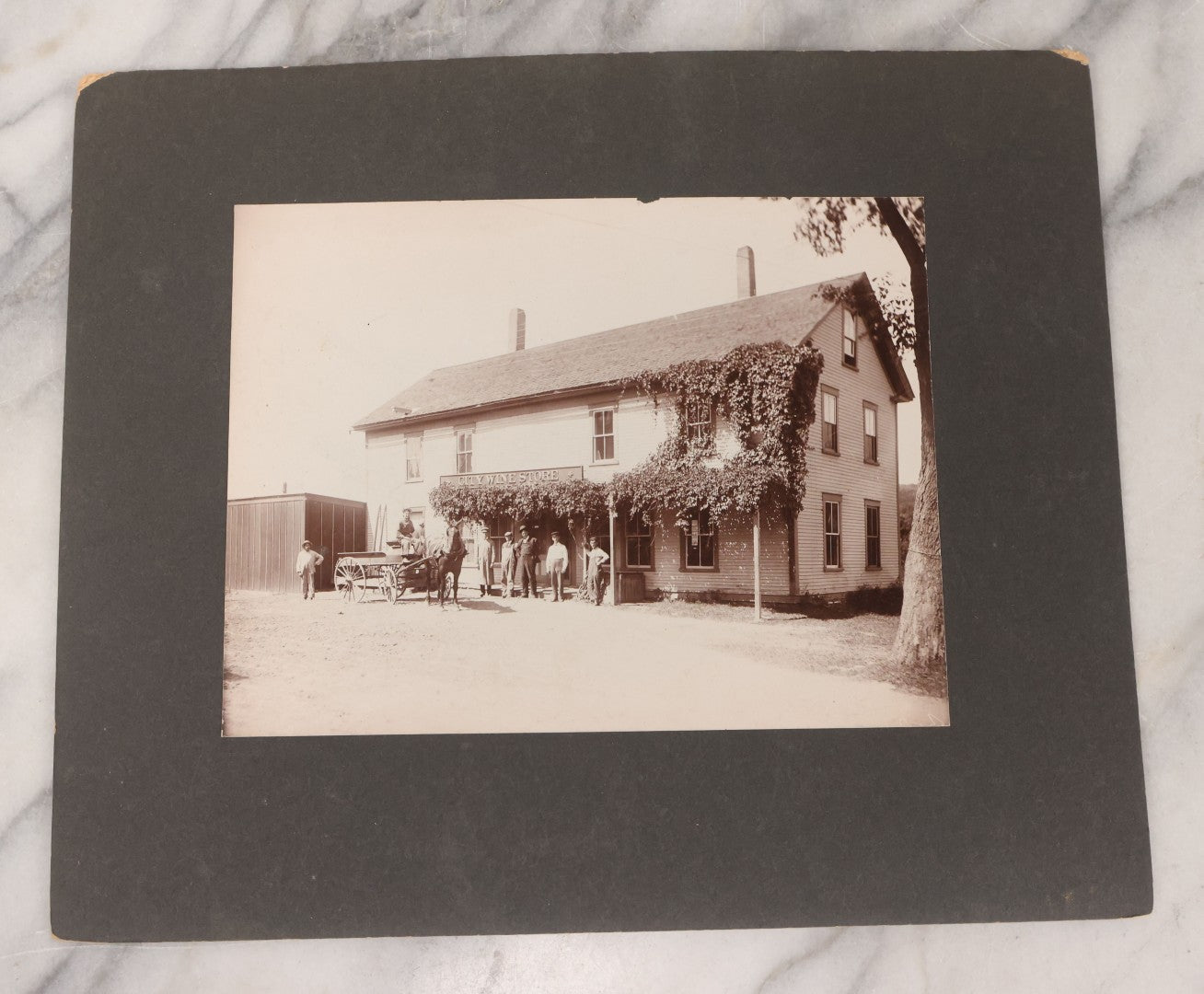 Lot 110 - Antique Boarded Occupational Photograph Of Merchants And Delivery Driver Posing Outside Of "City Wine Store," Likely From Western Massachusetts
