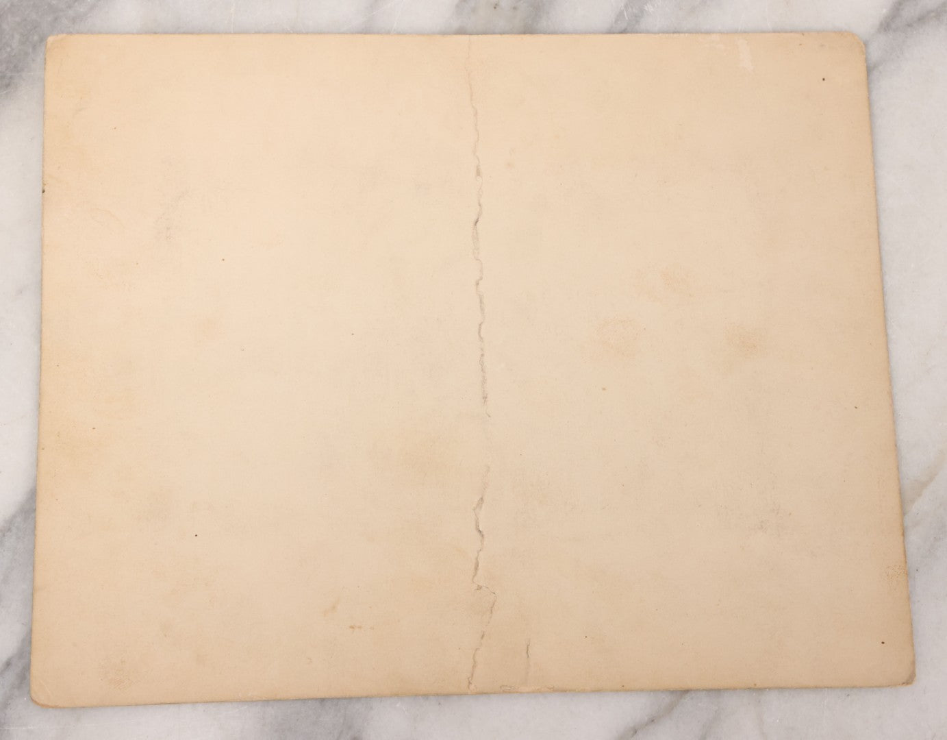 Lot 111 - Antique Boarded Occupational Photograph Of Workers And Dressmakers Posing Outside Their Shop, With Many Signs And Advertisements In Photo, Note Photo Has Large Crease Through Center On Verso