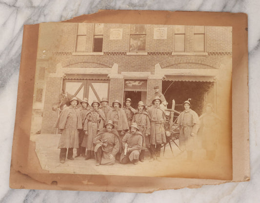 Lot 115 - Antique Boarded Occupational Photograph Of Group Of Late 19th Century Firefighters Posing With Their Horse Drawn Fire Engine And Their Firehouse Dog In Full Gear Outside Of Firehouse