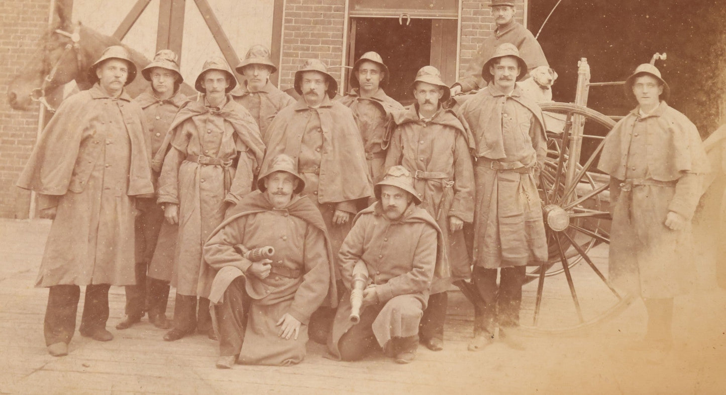 Lot 115 - Antique Boarded Occupational Photograph Of Group Of Late 19th Century Firefighters Posing With Their Horse Drawn Fire Engine And Their Firehouse Dog In Full Gear Outside Of Firehouse