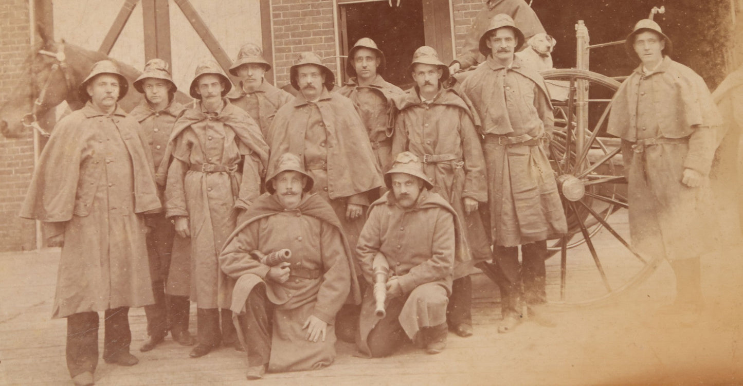 Lot 115 - Antique Boarded Occupational Photograph Of Group Of Late 19th Century Firefighters Posing With Their Horse Drawn Fire Engine And Their Firehouse Dog In Full Gear Outside Of Firehouse