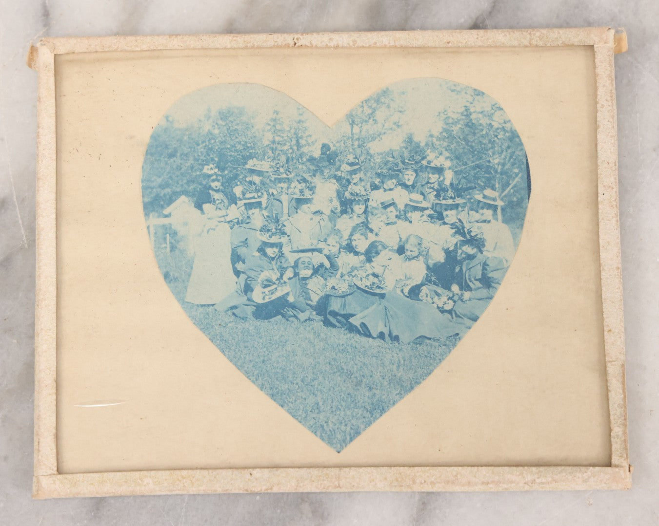 Lot 116 - Antique Heart Shaped Cyanotype Photograph Of Group Of Well Dressed Young Ladies Posing With Flowers In Handmade Paper And Glass Frame