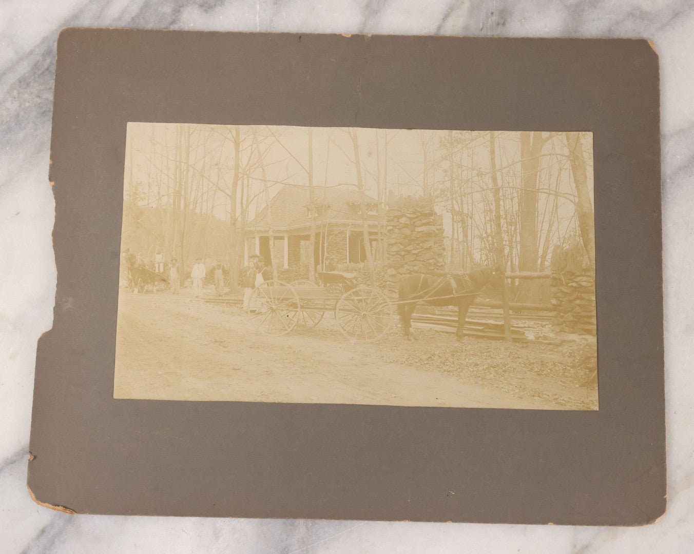 Lot 117 - Antique Boarded Occupational Photograph Of Travelers Waiting At The Trolley Station At The Entrance To Lake Nipmuc Park, Mendon, Massachusetts, Circa 1900, With Horse Drawn Wagon From Leland & Son Masons