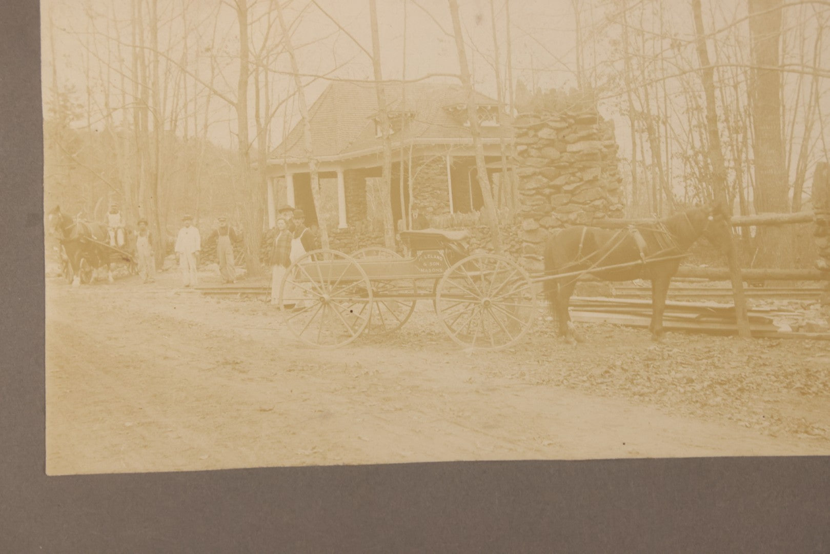 Lot 117 - Antique Boarded Occupational Photograph Of Travelers Waiting At The Trolley Station At The Entrance To Lake Nipmuc Park, Mendon, Massachusetts, Circa 1900, With Horse Drawn Wagon From Leland & Son Masons