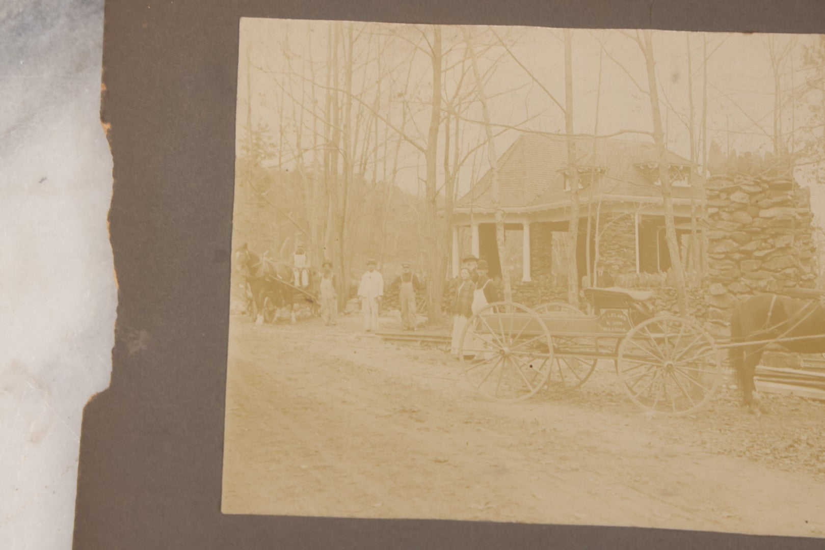 Lot 117 - Antique Boarded Occupational Photograph Of Travelers Waiting At The Trolley Station At The Entrance To Lake Nipmuc Park, Mendon, Massachusetts, Circa 1900, With Horse Drawn Wagon From Leland & Son Masons