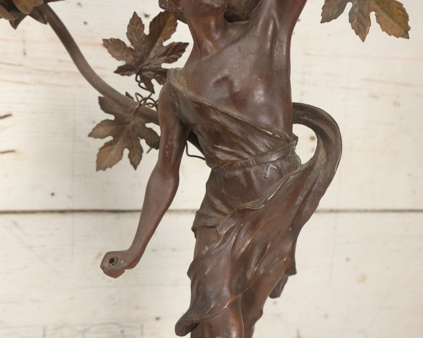 Lot 001 - Antique French Bronzed Spelter Art Nouveau Neo-Classical Revival Figural Lamp Base With Male Figure With Outstretched Arm Holding Torch And Three Curved Lighting Arms With Metal Leaves, Note Lamp Needs Complete Rewiring And Has Metal Damage