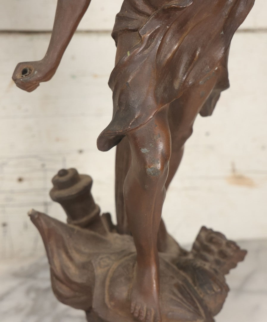 Lot 001 - Antique French Bronzed Spelter Art Nouveau Neo-Classical Revival Figural Lamp Base With Male Figure With Outstretched Arm Holding Torch And Three Curved Lighting Arms With Metal Leaves, Note Lamp Needs Complete Rewiring And Has Metal Damage