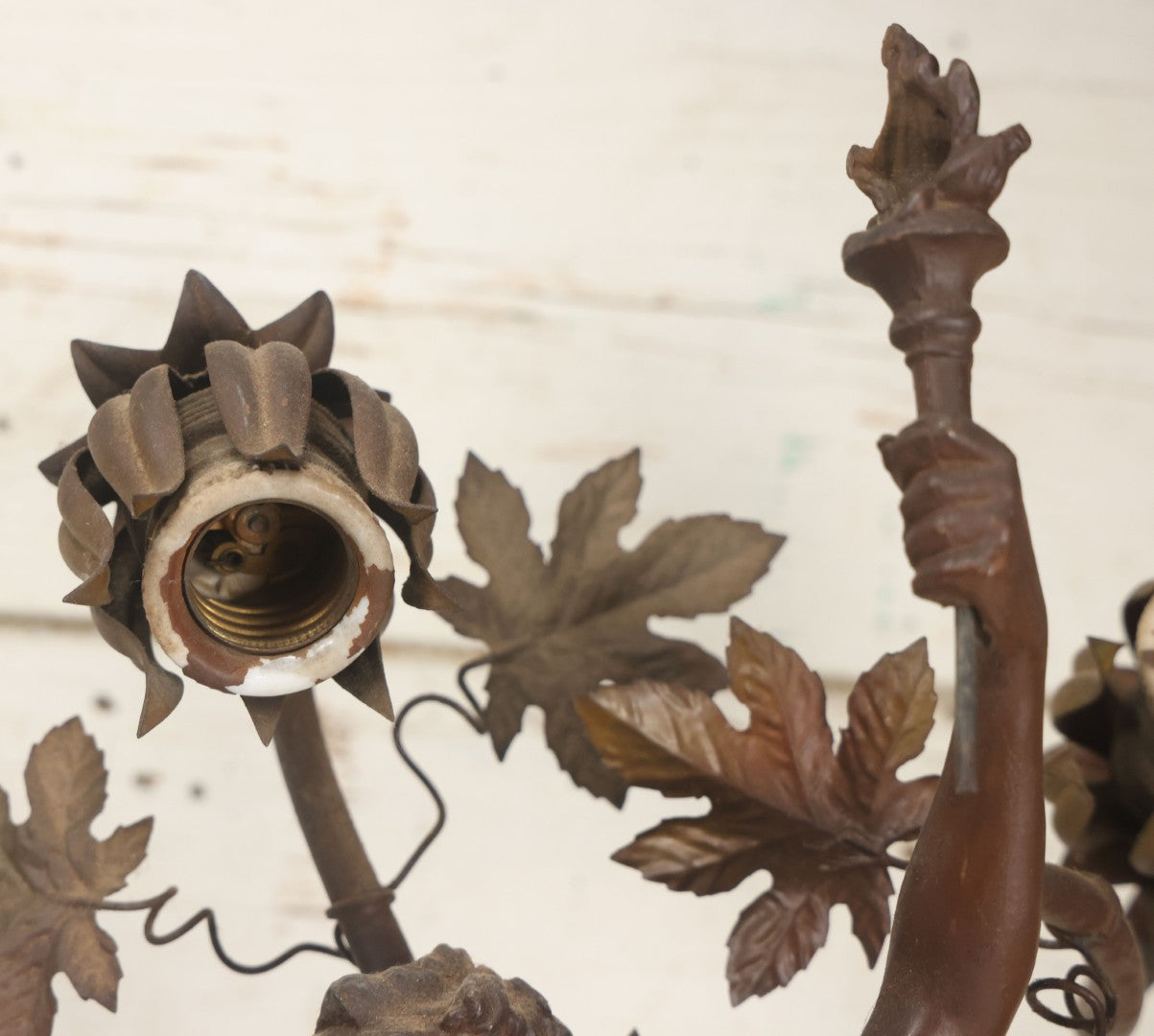 Lot 001 - Antique French Bronzed Spelter Art Nouveau Neo-Classical Revival Figural Lamp Base With Male Figure With Outstretched Arm Holding Torch And Three Curved Lighting Arms With Metal Leaves, Note Lamp Needs Complete Rewiring And Has Metal Damage