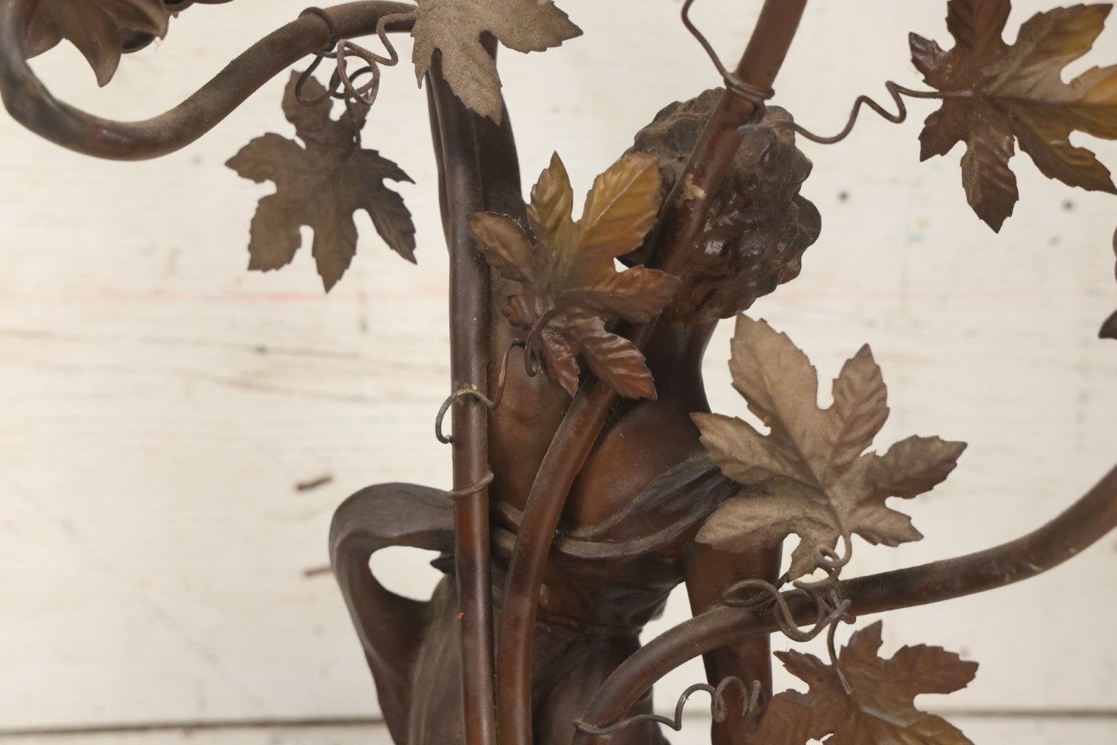 Lot 001 - Antique French Bronzed Spelter Art Nouveau Neo-Classical Revival Figural Lamp Base With Male Figure With Outstretched Arm Holding Torch And Three Curved Lighting Arms With Metal Leaves, Note Lamp Needs Complete Rewiring And Has Metal Damage