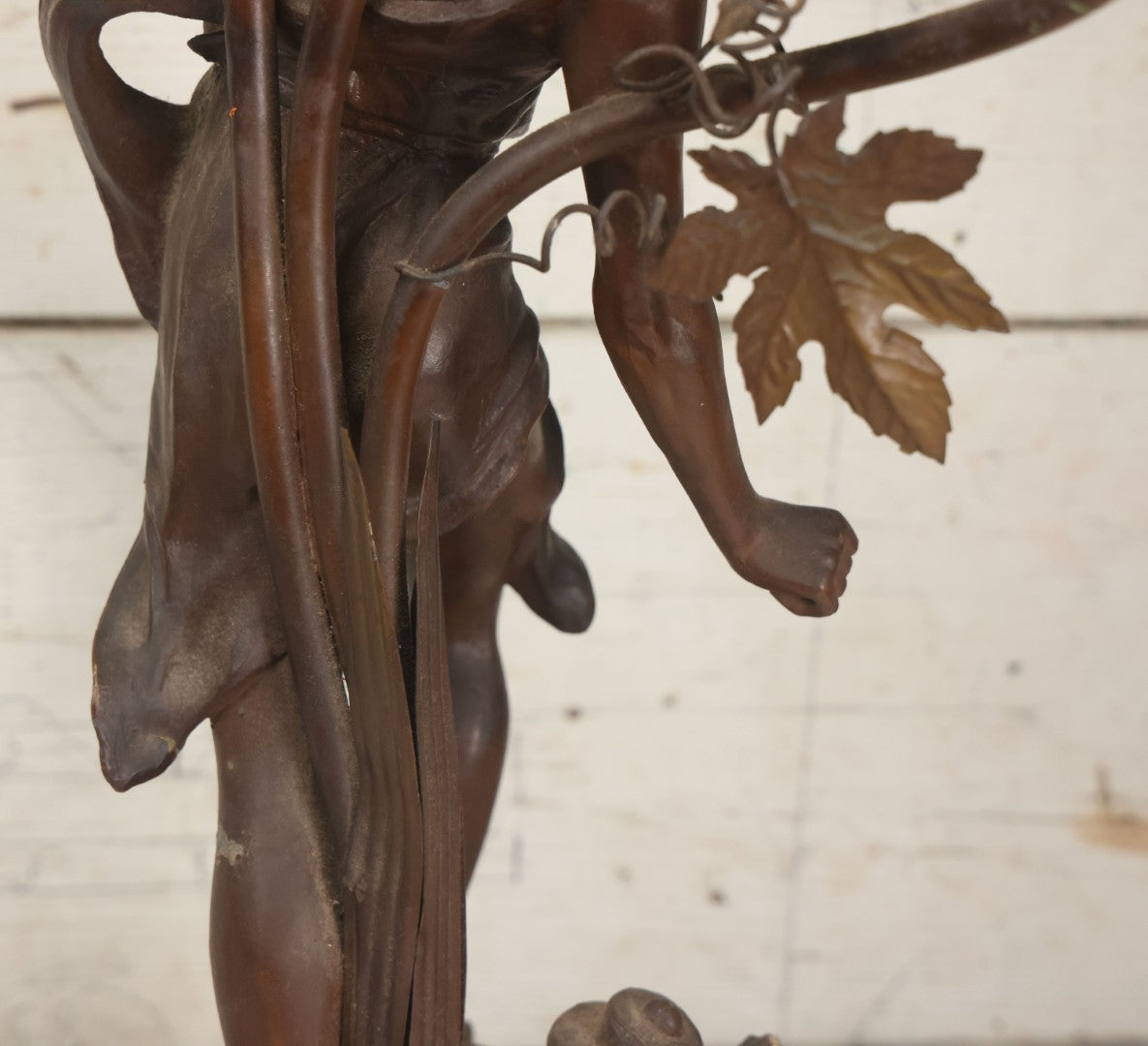 Lot 001 - Antique French Bronzed Spelter Art Nouveau Neo-Classical Revival Figural Lamp Base With Male Figure With Outstretched Arm Holding Torch And Three Curved Lighting Arms With Metal Leaves, Note Lamp Needs Complete Rewiring And Has Metal Damage