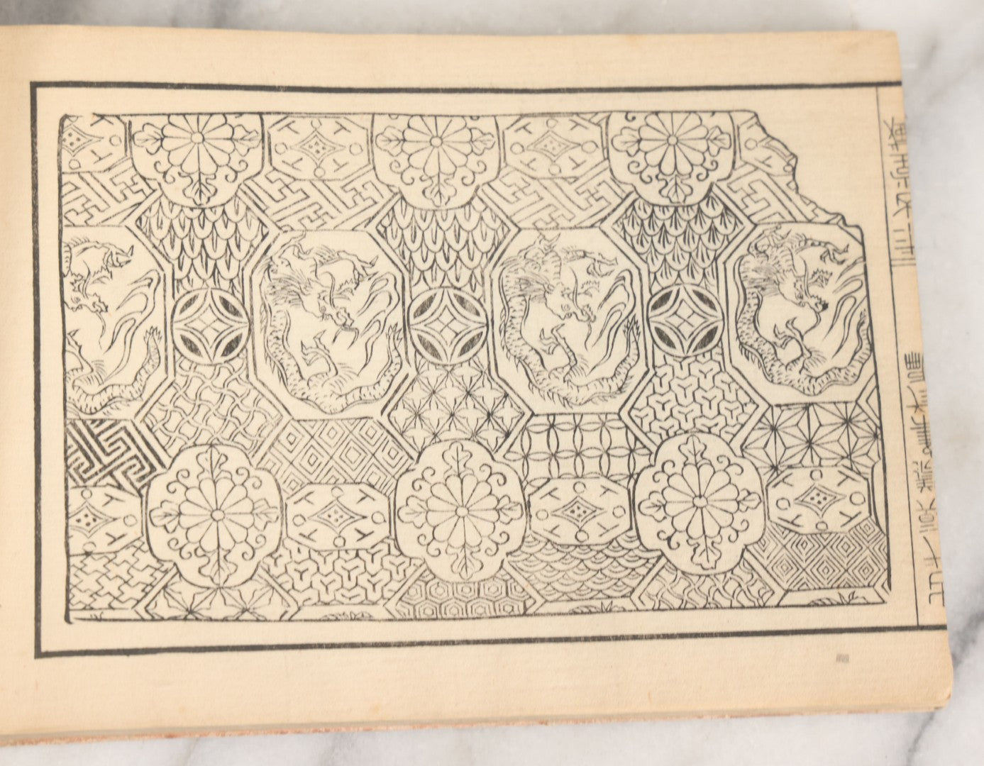 Lot 002 - Antique Japanese Meiji-Era Hingata-Bon Or Zuan-Cho Kimono Textile Design Pattern Collection Book With Dozens Of Printed Design Examples, With Paper Cover, Hand Strung Binding, Circa 1880