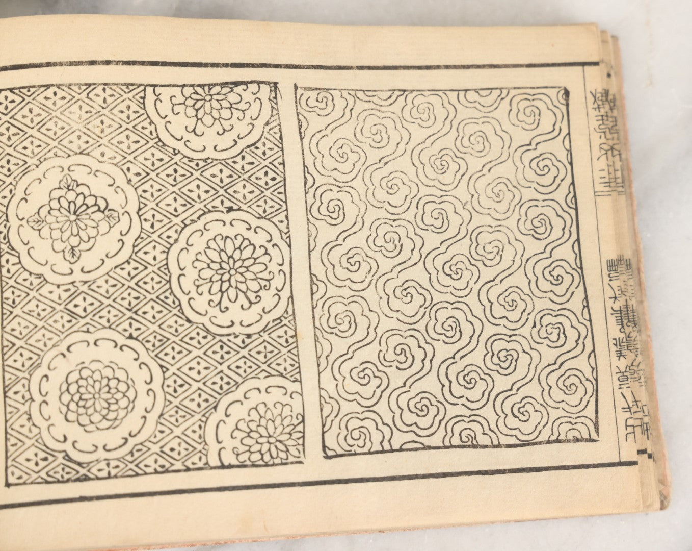 Lot 002 - Antique Japanese Meiji-Era Hingata-Bon Or Zuan-Cho Kimono Textile Design Pattern Collection Book With Dozens Of Printed Design Examples, With Paper Cover, Hand Strung Binding, Circa 1880