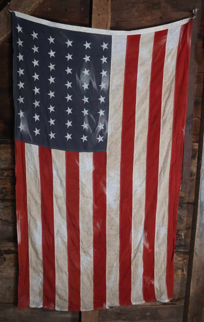 Lot 006 - Vintage 48 Star American Flag, marked 4' x 6', Note Staining To Blue Field, Measures 41" x 68"