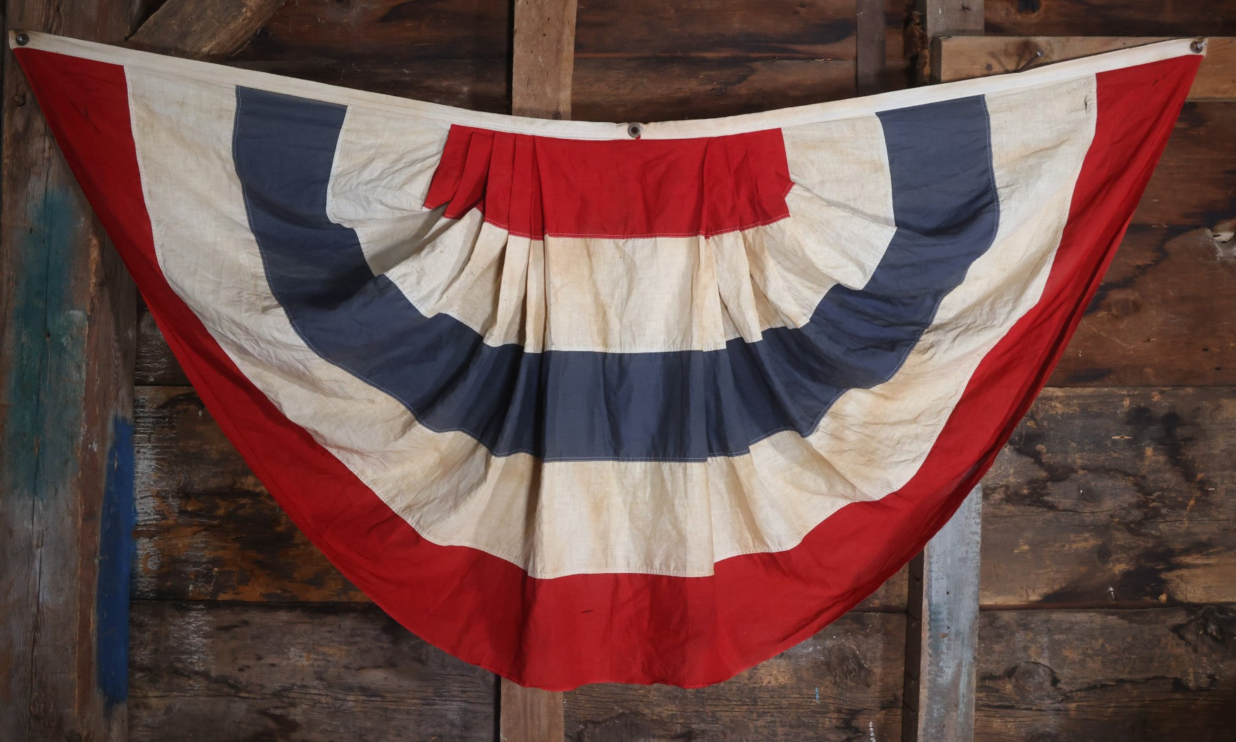 Lot 007 - Vintage Red White And Blue Patriotic Bunting, Note Holes, Fading, And Staining, 76" W x 34" H