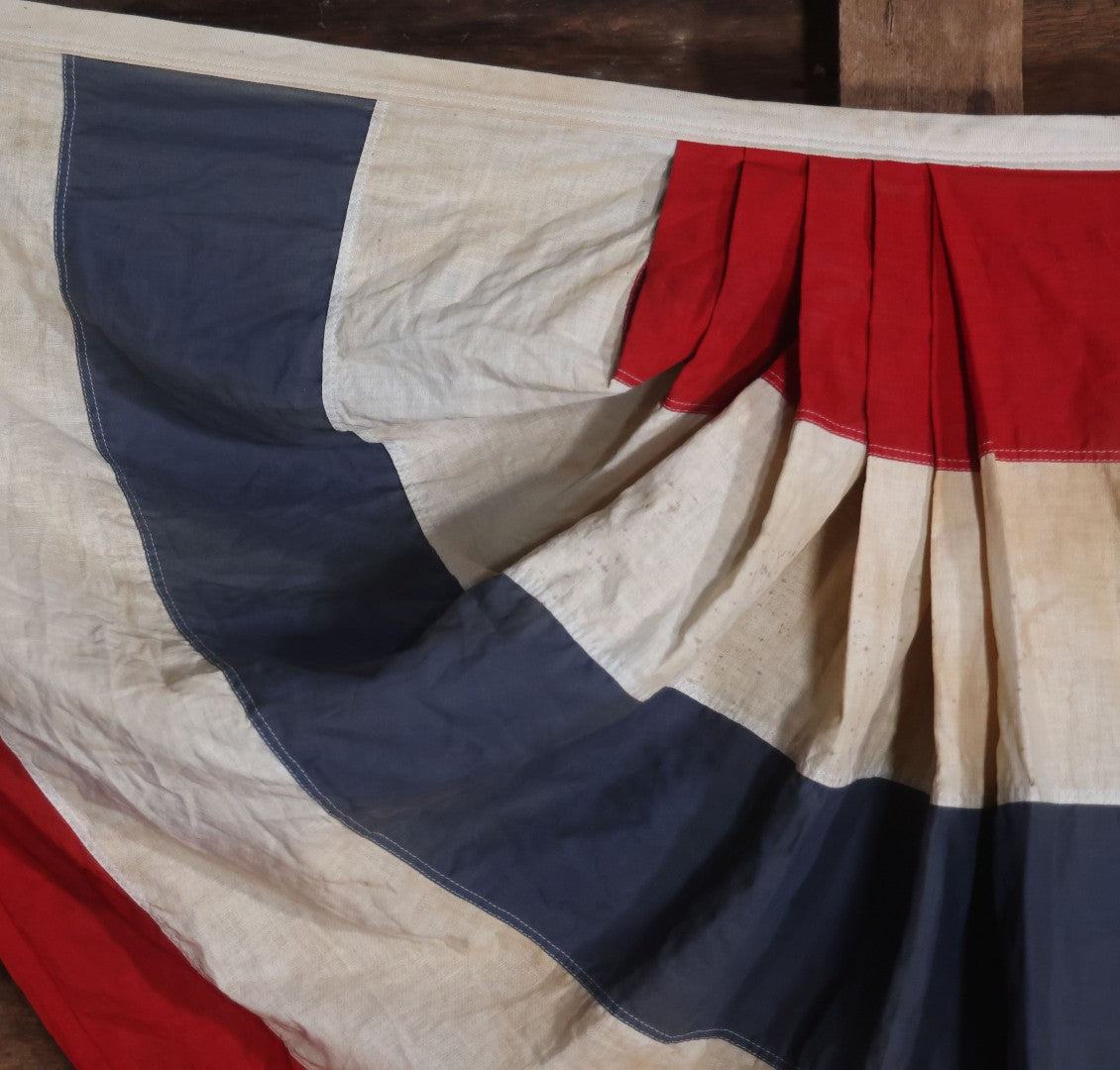 Lot 007 - Vintage Red White And Blue Patriotic Bunting, Note Holes, Fading, And Staining, 76" W x 34" H