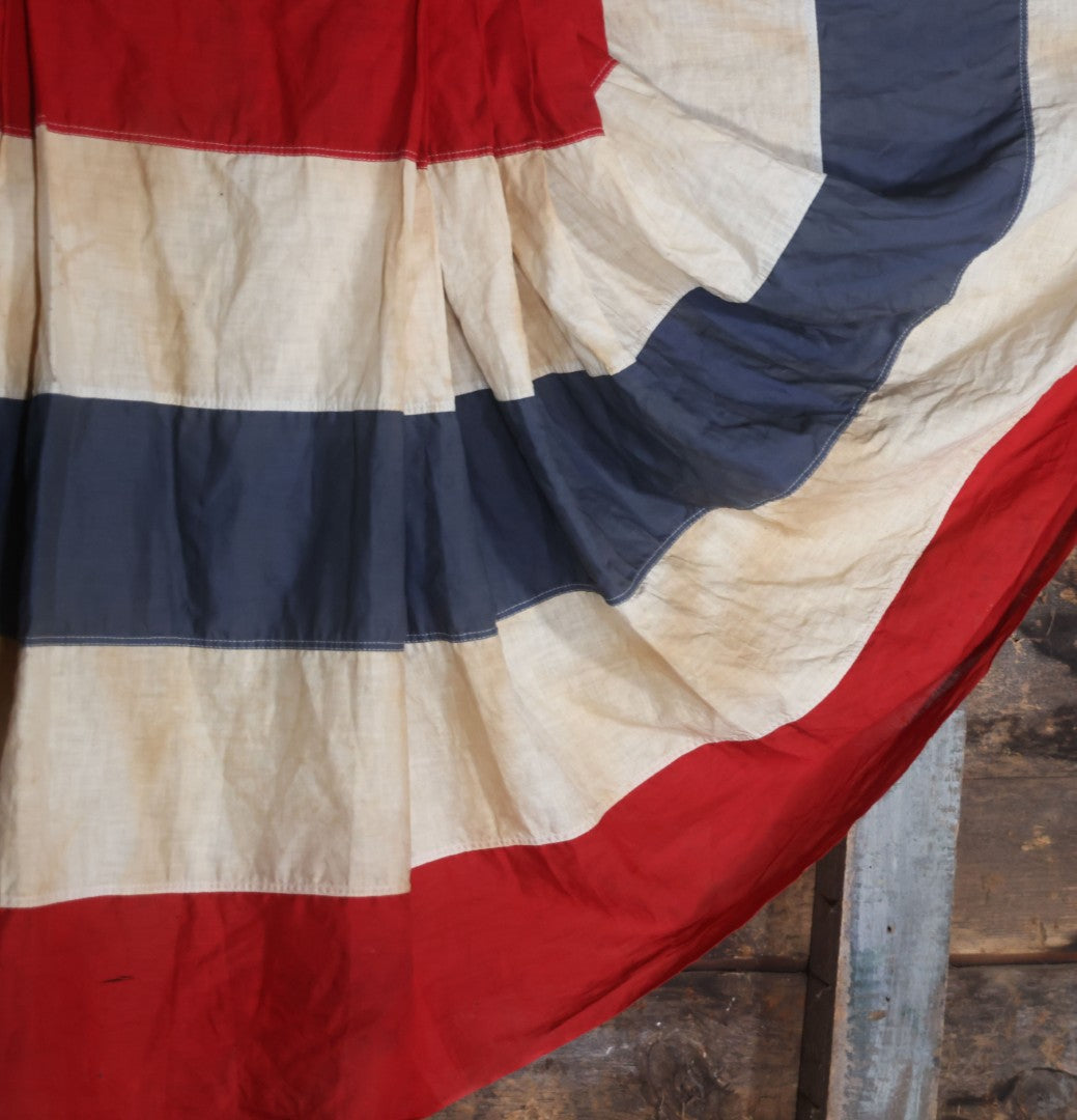 Lot 007 - Vintage Red White And Blue Patriotic Bunting, Note Holes, Fading, And Staining, 76" W x 34" H