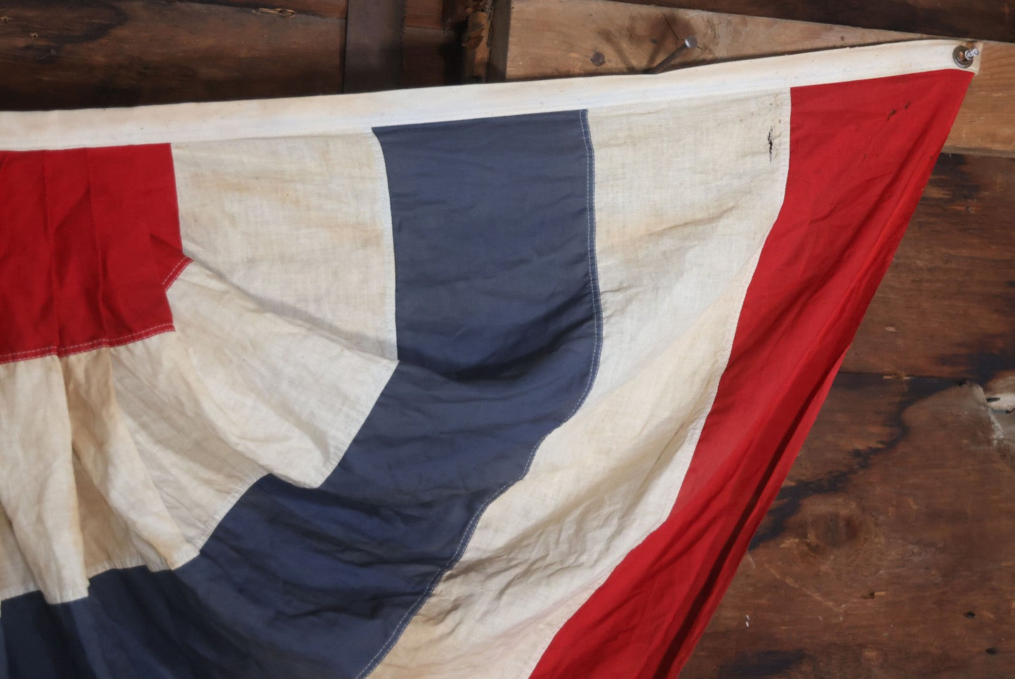 Lot 007 - Vintage Red White And Blue Patriotic Bunting, Note Holes, Fading, And Staining, 76" W x 34" H