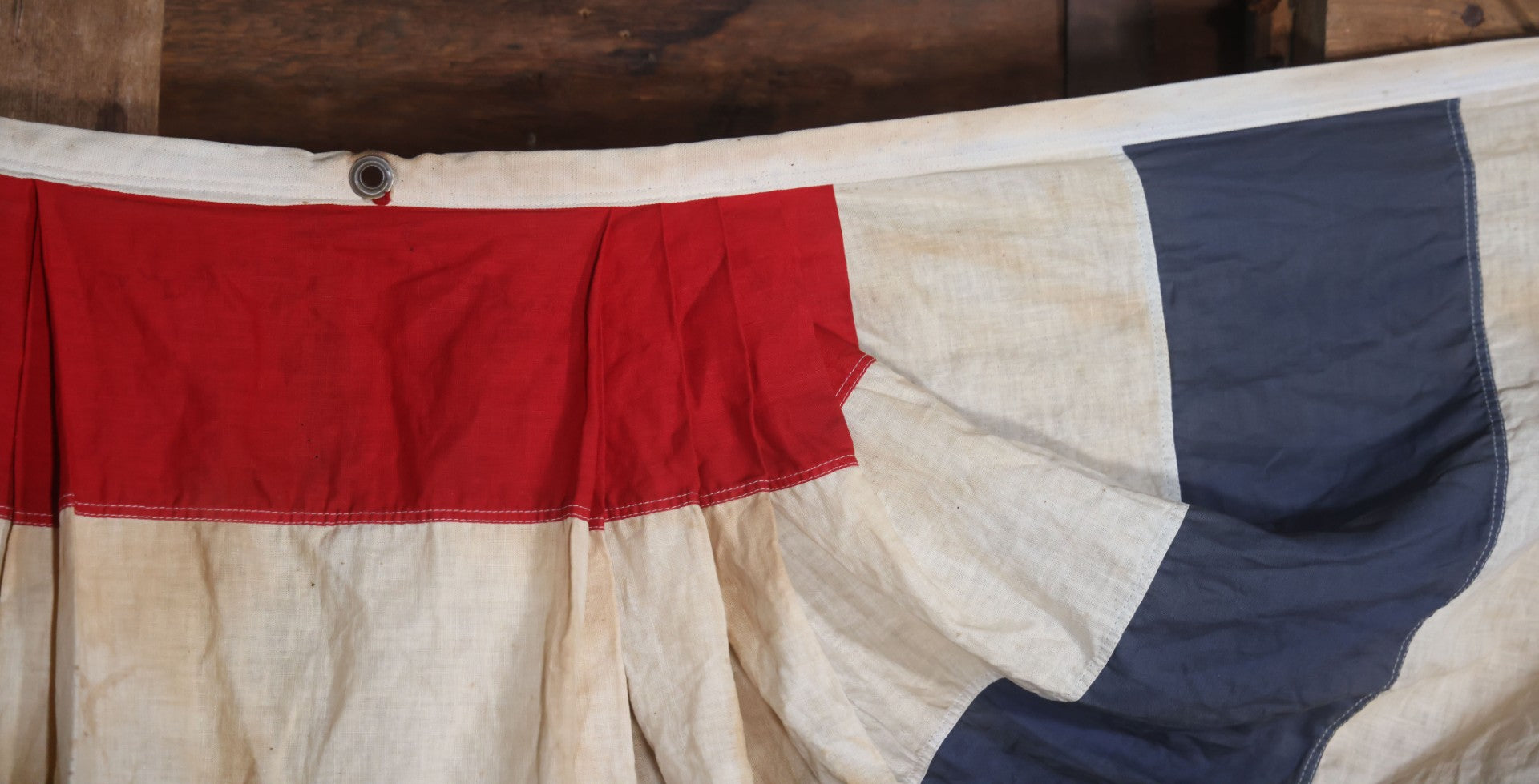 Lot 007 - Vintage Red White And Blue Patriotic Bunting, Note Holes, Fading, And Staining, 76" W x 34" H