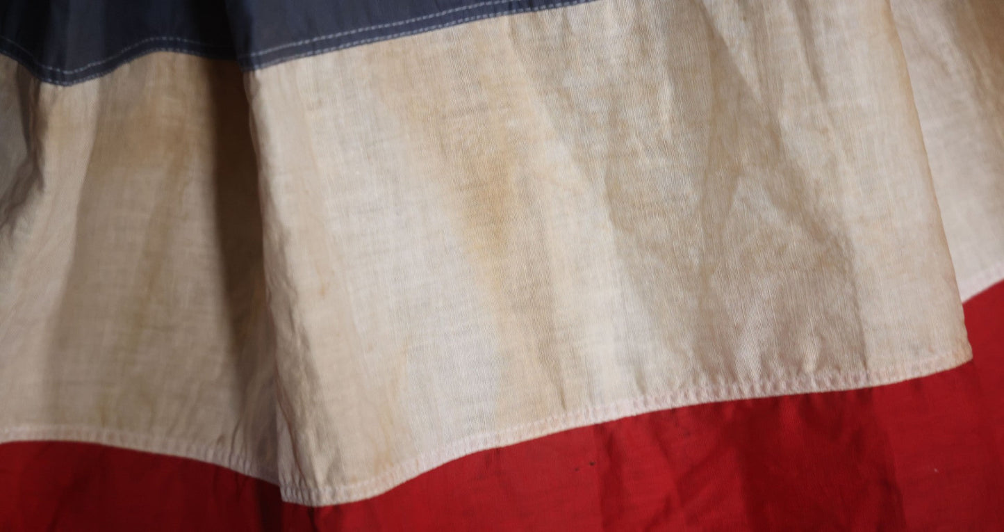 Lot 007 - Vintage Red White And Blue Patriotic Bunting, Note Holes, Fading, And Staining, 76" W x 34" H