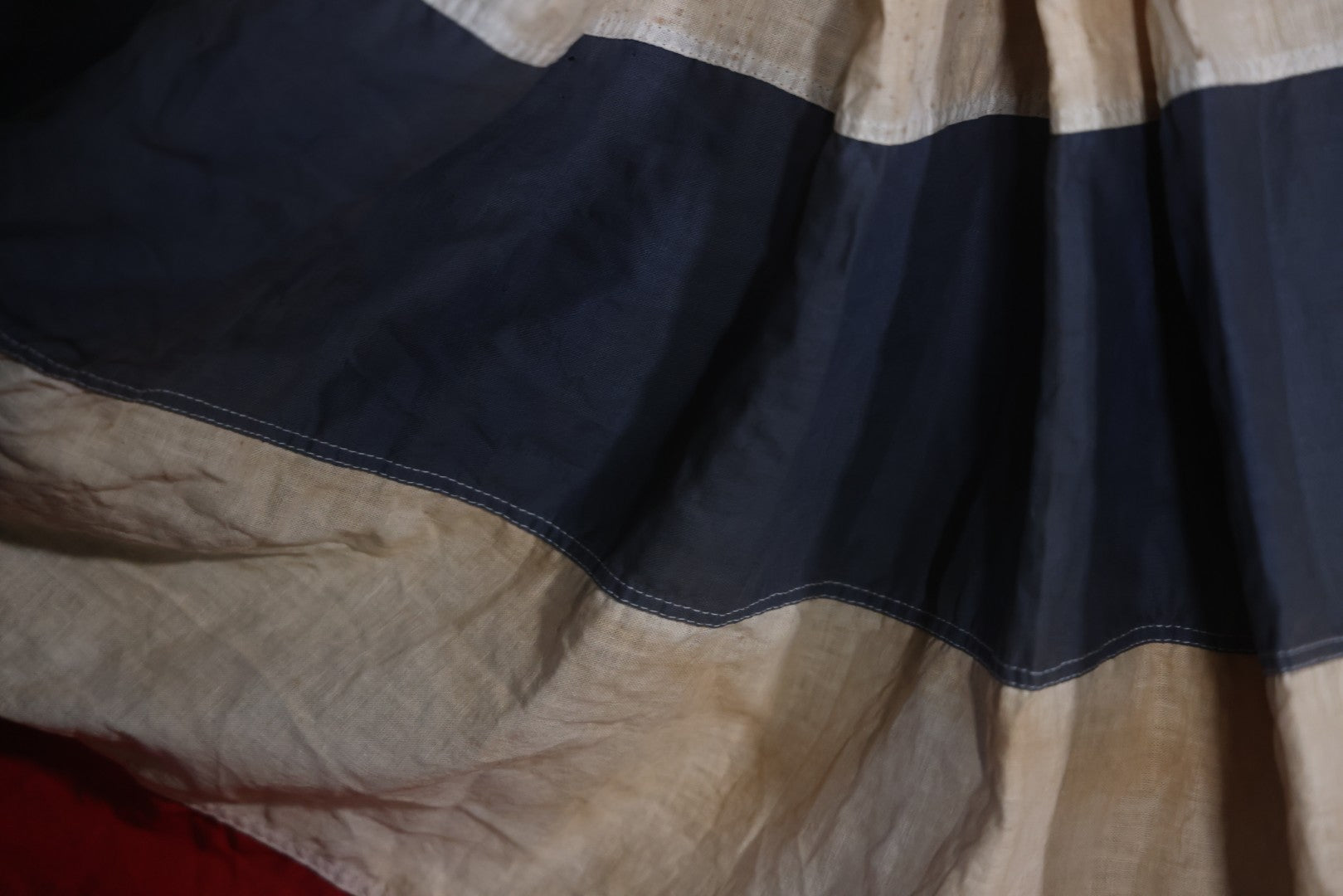 Lot 007 - Vintage Red White And Blue Patriotic Bunting, Note Holes, Fading, And Staining, 76" W x 34" H