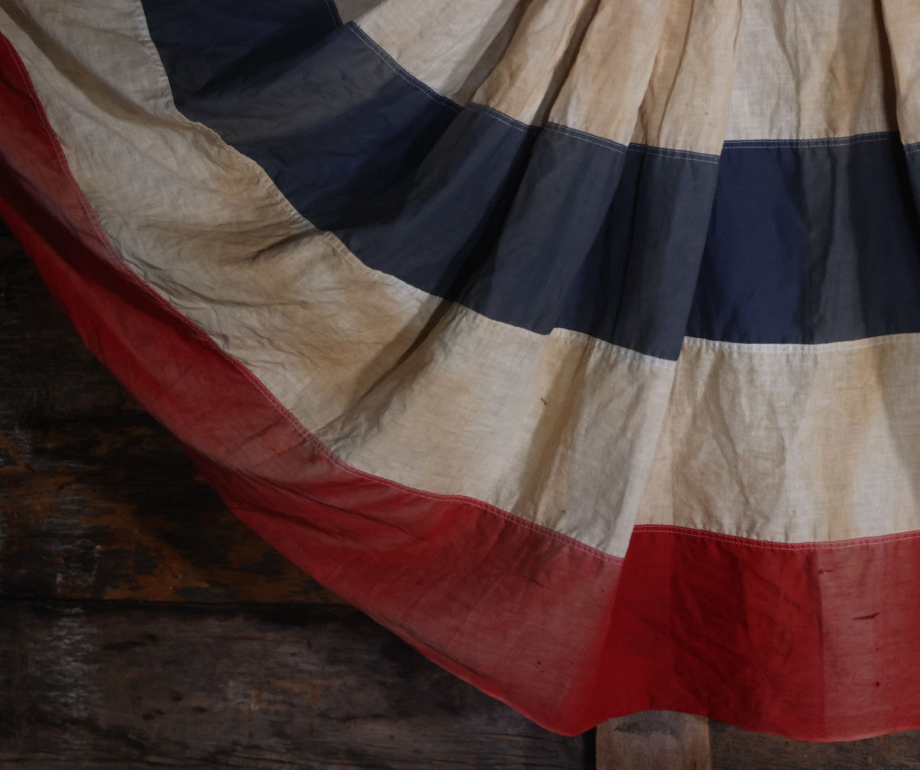 Lot 007 - Vintage Red White And Blue Patriotic Bunting, Note Holes, Fading, And Staining, 76" W x 34" H
