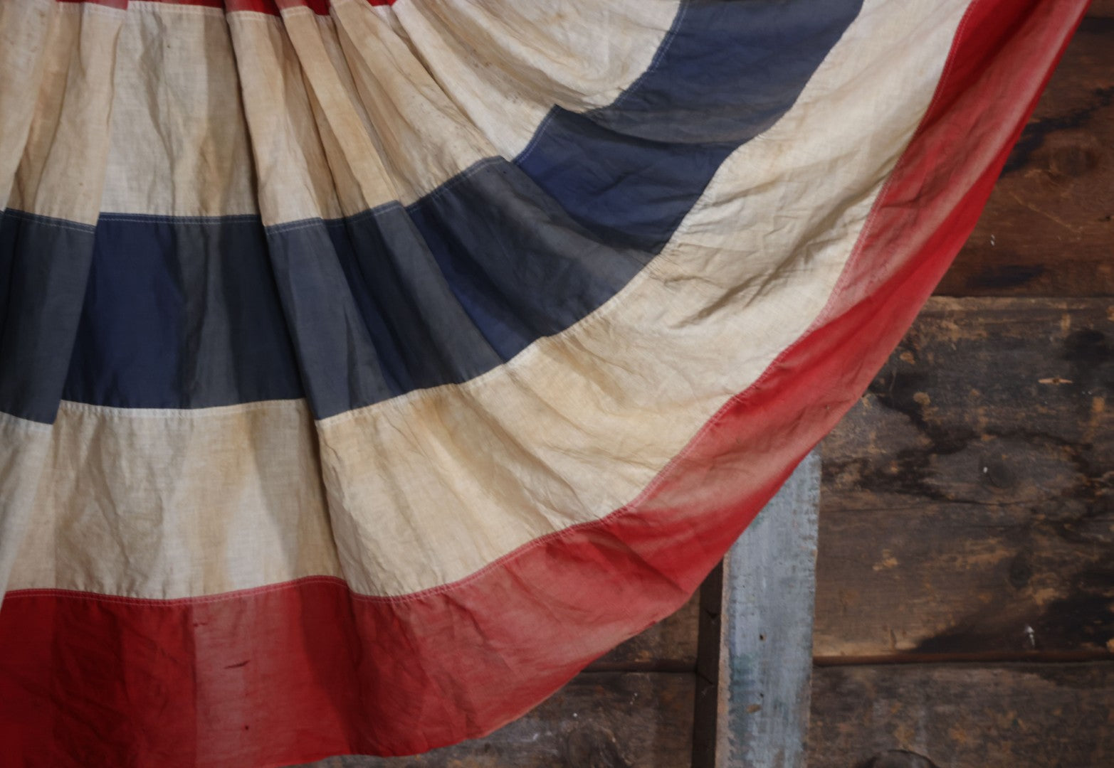 Lot 007 - Vintage Red White And Blue Patriotic Bunting, Note Holes, Fading, And Staining, 76" W x 34" H