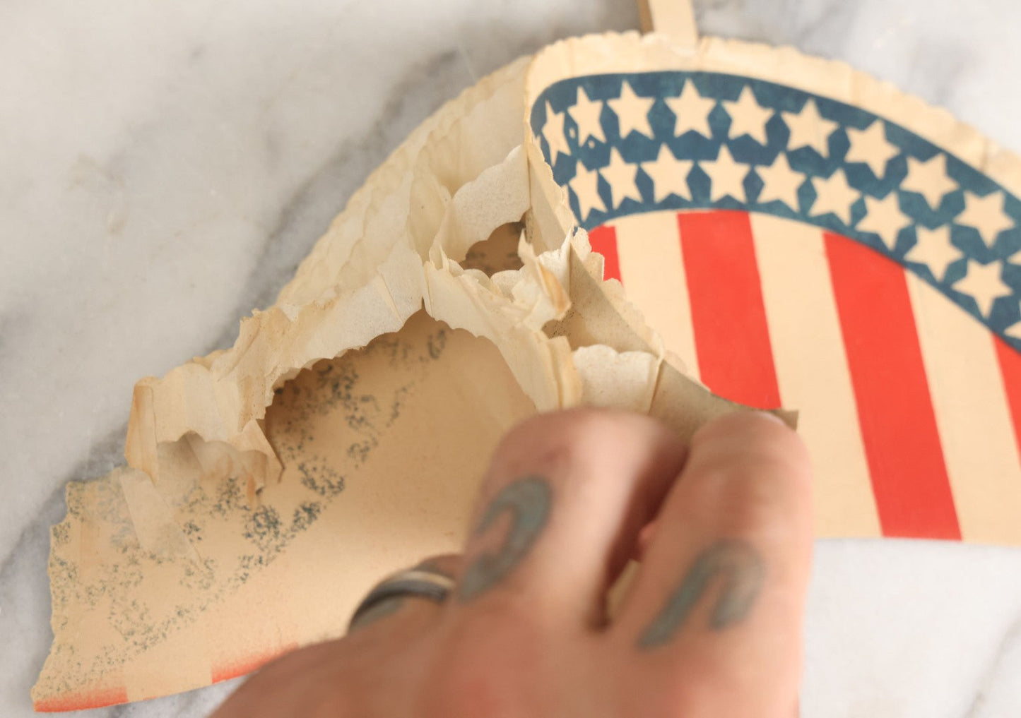 Lot 009 - Vintage American Flag Themed Red White And Blue Independence Day Party Hat With Honeycomb Paper And Pom Pom, Note, Creases, Tears, And Losses