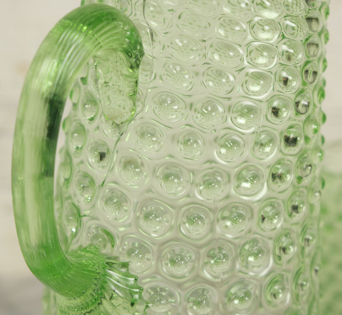 Lot 014 - Vintage Six Piece Hobnail Uranium Glass Drinking Collection With Pitcher And Four Matching Cups Plus Additional Cup, U.V. Blacklight Reactive Glass, Note Chips And Cracks