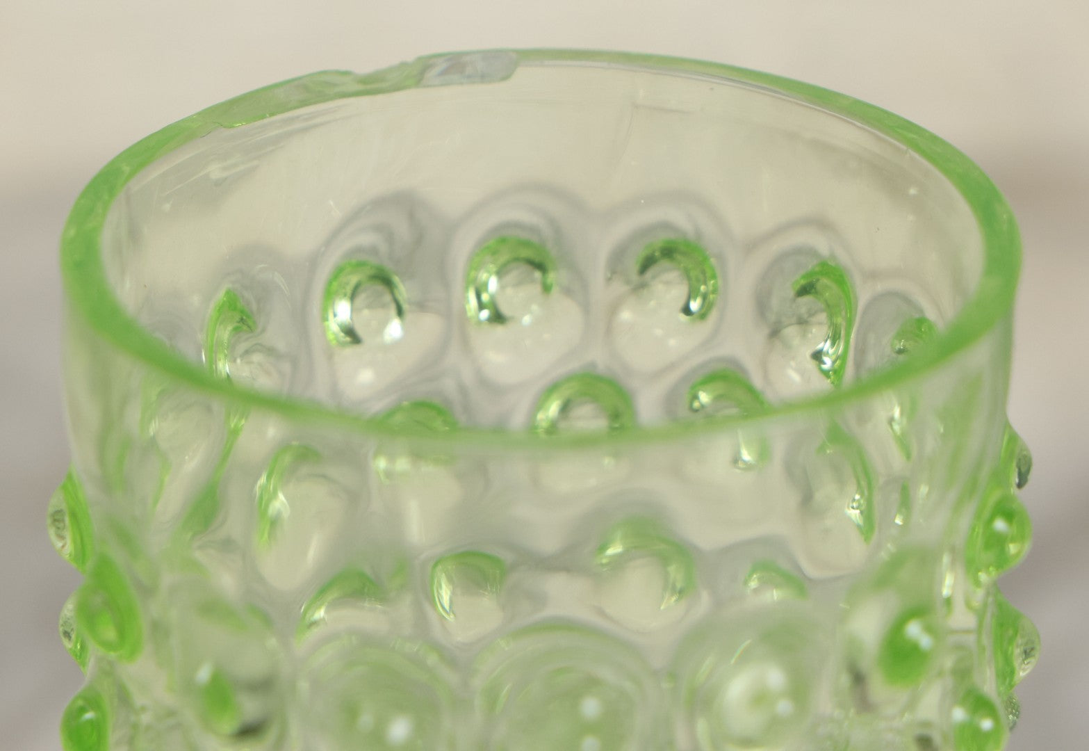 Lot 014 - Vintage Six Piece Hobnail Uranium Glass Drinking Collection With Pitcher And Four Matching Cups Plus Additional Cup, U.V. Blacklight Reactive Glass, Note Chips And Cracks