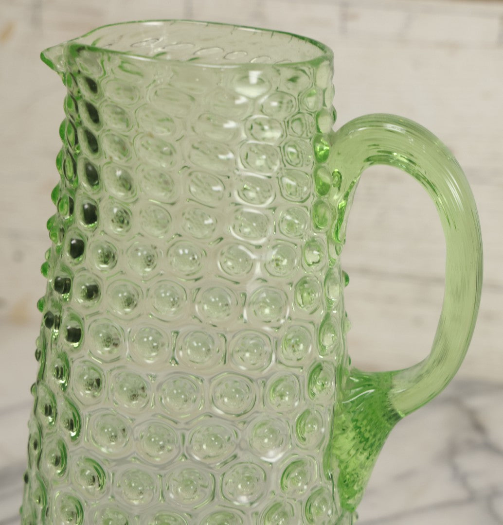 Lot 014 - Vintage Six Piece Hobnail Uranium Glass Drinking Collection With Pitcher And Four Matching Cups Plus Additional Cup, U.V. Blacklight Reactive Glass, Note Chips And Cracks
