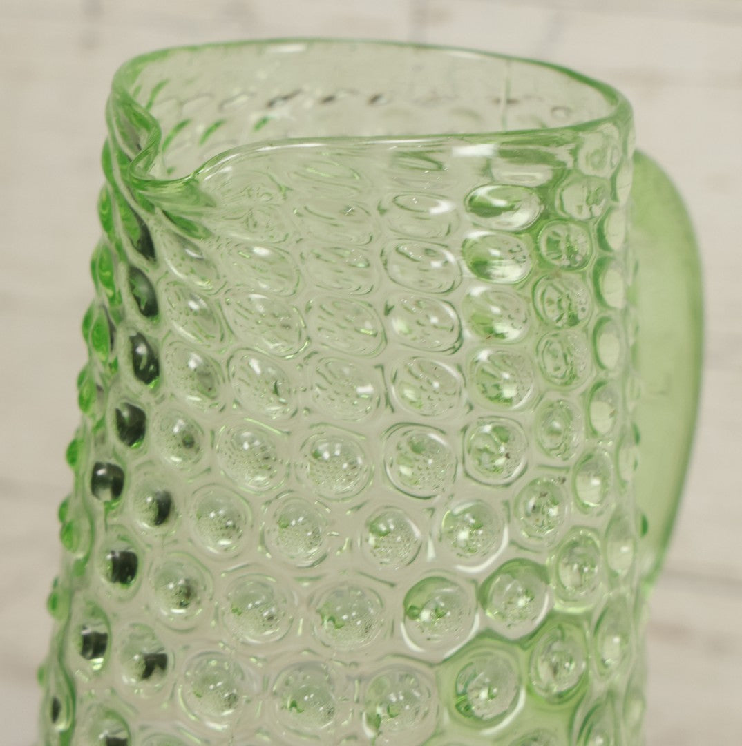 Lot 014 - Vintage Six Piece Hobnail Uranium Glass Drinking Collection With Pitcher And Four Matching Cups Plus Additional Cup, U.V. Blacklight Reactive Glass, Note Chips And Cracks