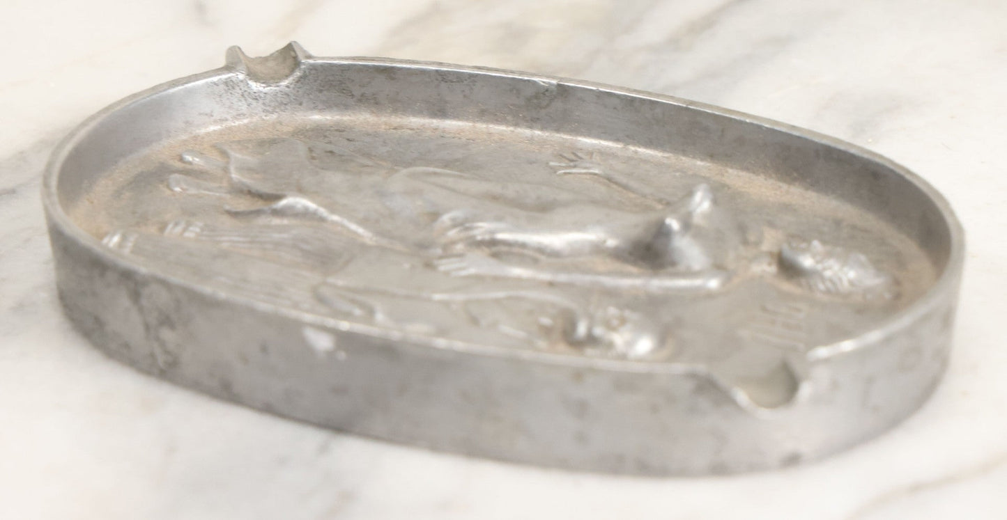 Lot 024 - Vintage Cast Aluminum "Oh! Ah!" Risqué Ashtray With Little Man Grabbing A Surprised Lady's Behind