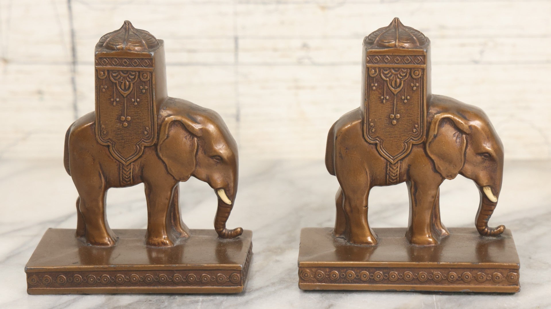 Lot 025 - Pair Of Antique Cast Metal Eastern Influence Elephant Bookends In Bronze Paint Finish, Copyright L.V. Aronson, 1923