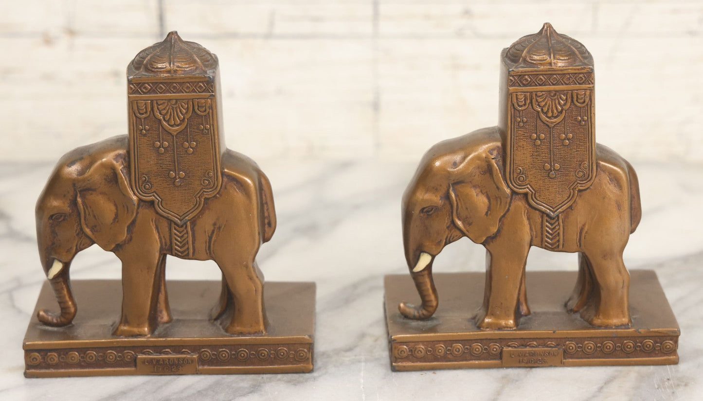Lot 025 - Pair Of Antique Cast Metal Eastern Influence Elephant Bookends In Bronze Paint Finish, Copyright L.V. Aronson, 1923