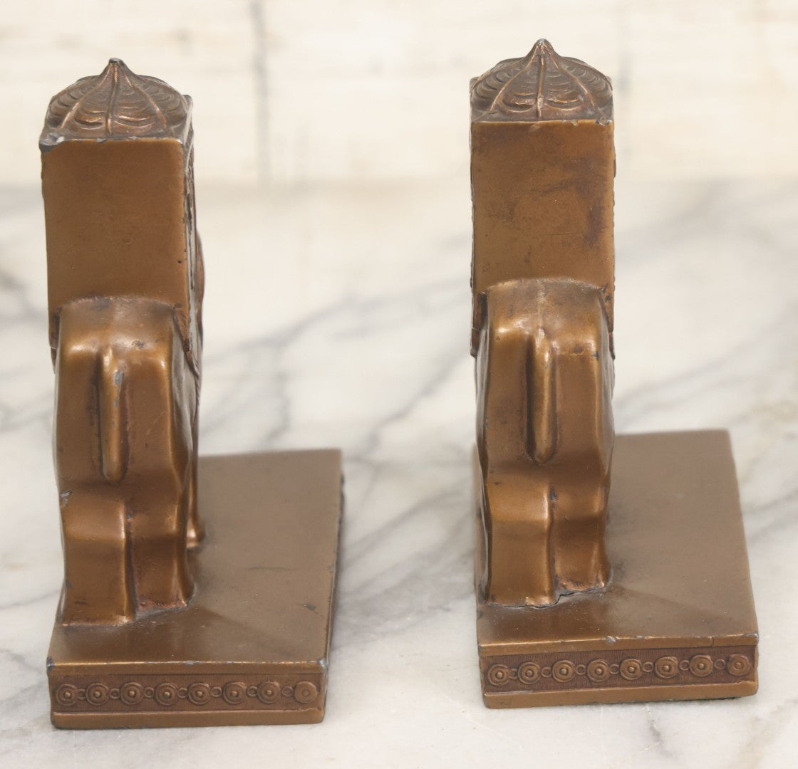Lot 025 - Pair Of Antique Cast Metal Eastern Influence Elephant Bookends In Bronze Paint Finish, Copyright L.V. Aronson, 1923