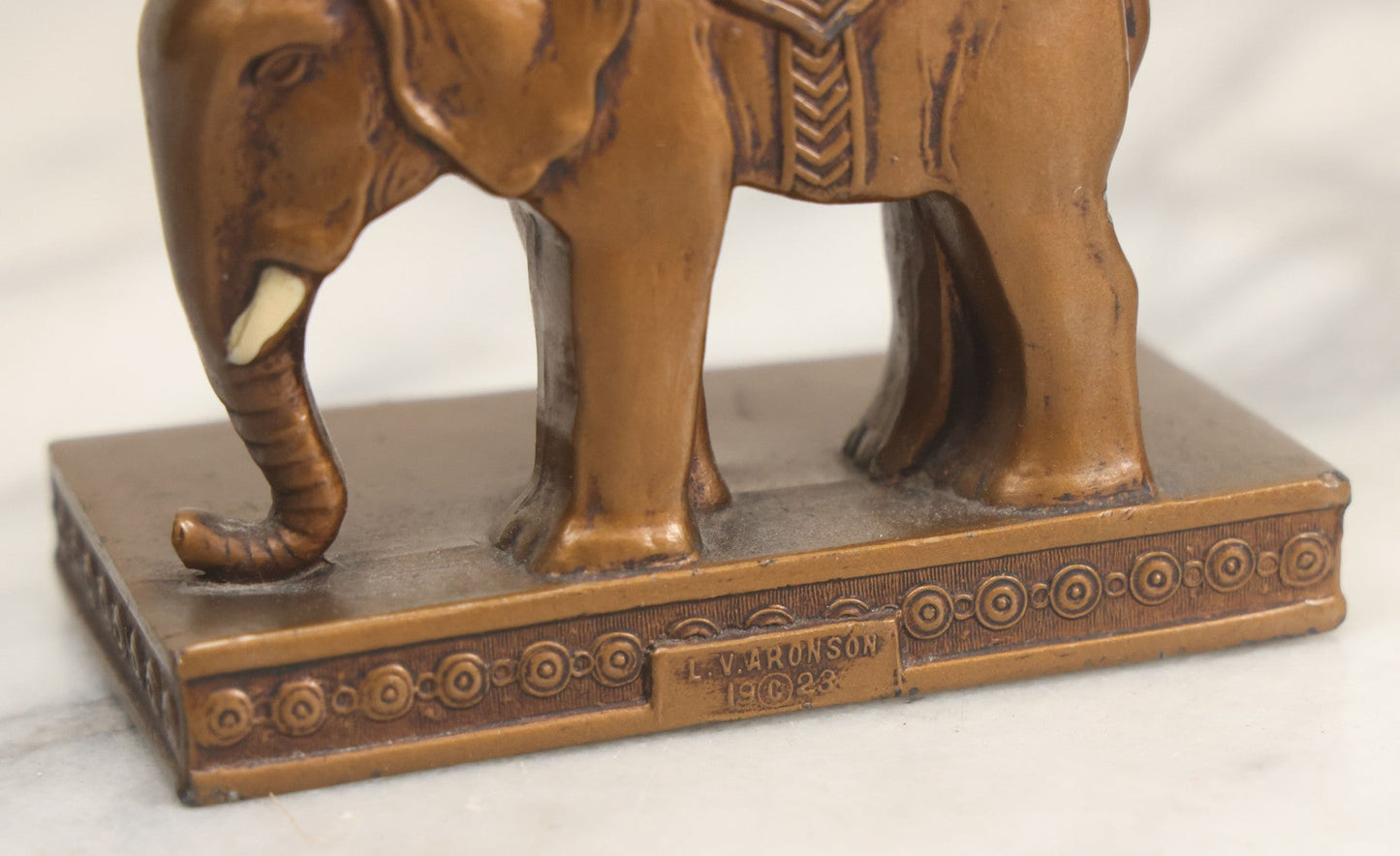 Lot 025 - Pair Of Antique Cast Metal Eastern Influence Elephant Bookends In Bronze Paint Finish, Copyright L.V. Aronson, 1923